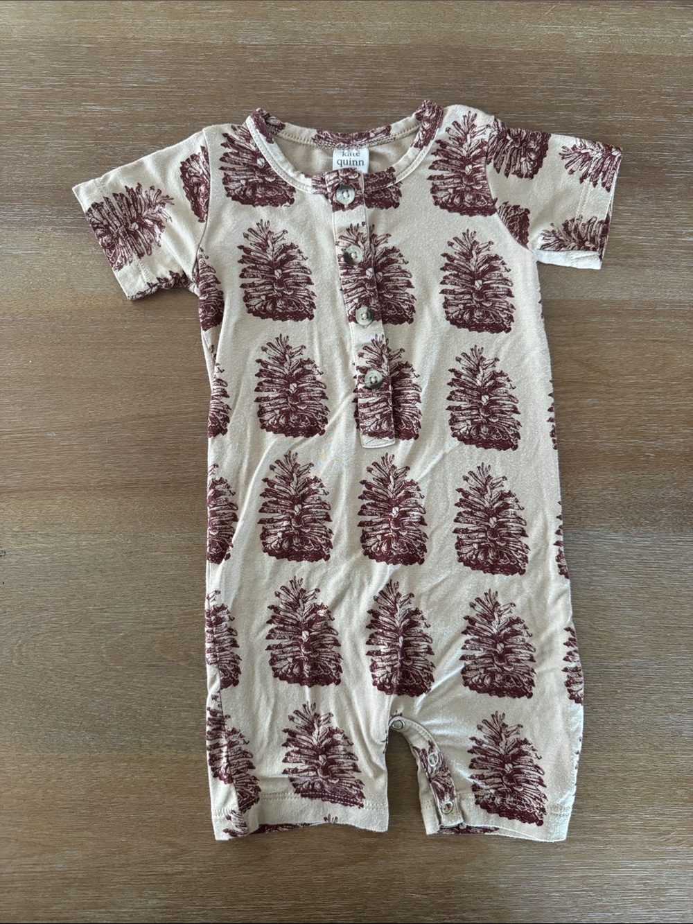 Kate Quinn pinecone romper